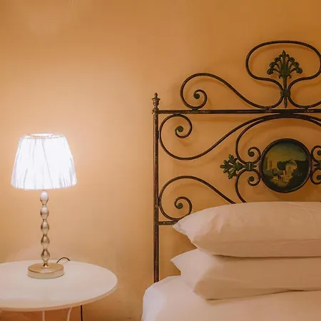 Gæstehus Palazzo Romani Adami 4*